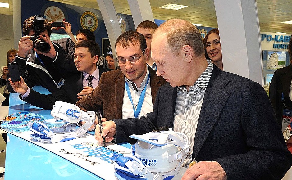 During visit to exposition of Russian regions at the Olympic Park.