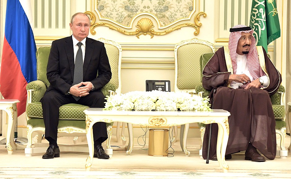 At the signing ceremony of Russian-Saudi documents. With King Salman bin Abdulaziz Al Saud of Saudi Arabia.
