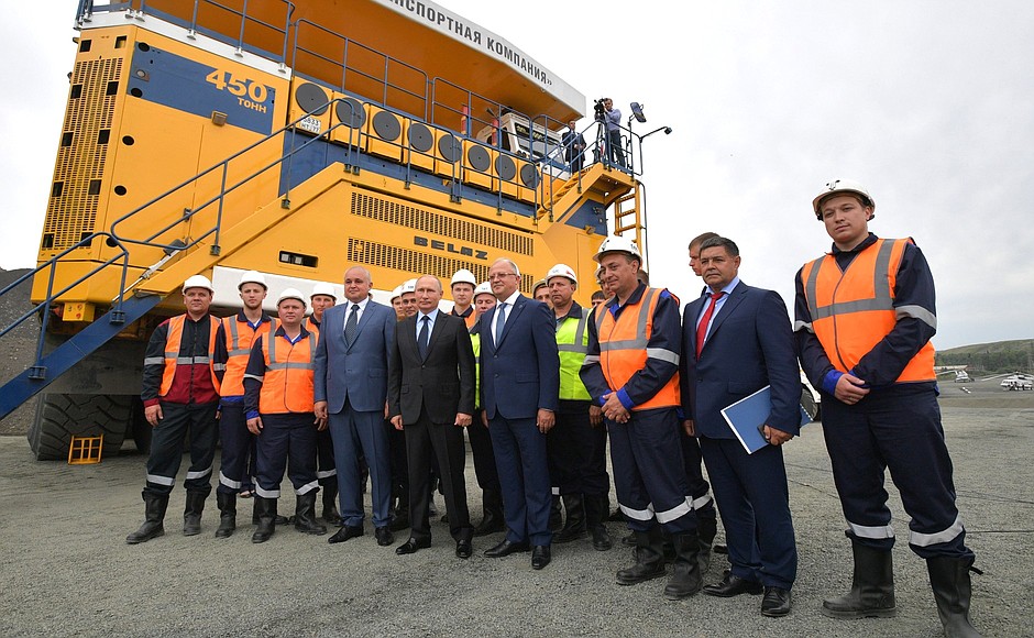 With workers of the Chernigovets open-cut mine.