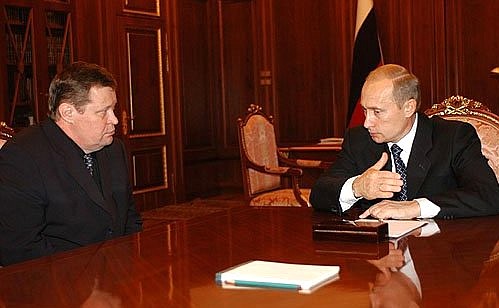 President Vladimir Putin meeting with Prosecutor General Vladimir Ustinov.