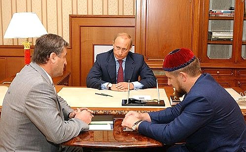 A meeting with Alu Alkhanov, the head of the Public Council for Control over the Restoration of the Economy and Social Sphere, and Ramzan Kadyrov, the Chechen Republic\'s first deputy prime minister.