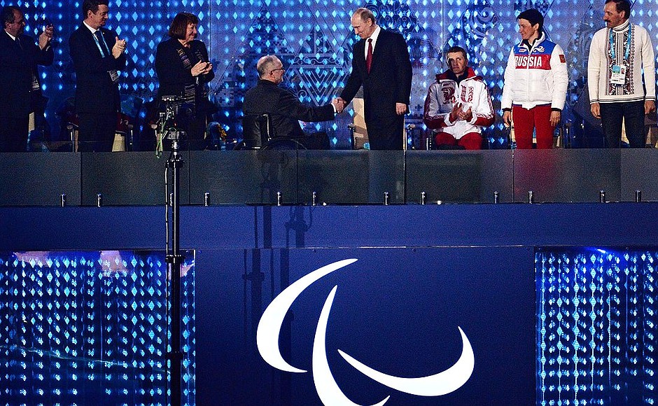 At the closing ceremony of the XI Paralympic Winter Games.