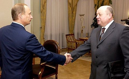 President Putin meeting with Mikhail Fradkov, a candidate for prime minister.
