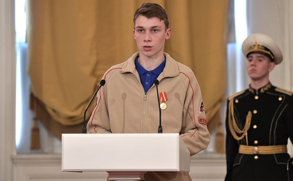 Ceremony for presenting national awards. Member of the children and youth movement Yunarmiya (Young Army) Aleksandr Ptushko.