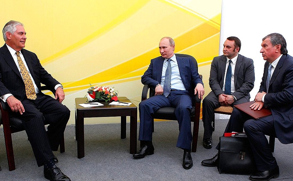 With President and Chairman of the Board of ExxonMobil Rex Tillerson. On the far right is President and Management Board Chairman of Rosneft Igor Sechin.