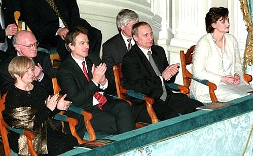 Vladimir Putin with his wife Lyudmila and British Prime Minister Tony Blair with his wife Cherie at the premiere of the “War and Peace” opera.
