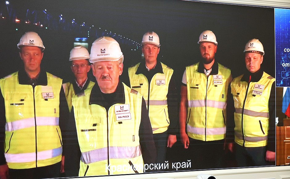Mostostroi-11 employees at the opening ceremony of a highway bridge across the Yenisei River near the village of Vysokogorsky in the north of the Krasnoyarsk Territory (via videoconference).