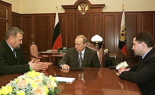 President Putin meeting with Akhmat Kadyrov, head of the Chechen administration, and Mikhail Babich, the Chechen Prime Minister.
