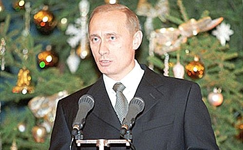 President Vladimir Putin giving a speech at a reception dedicated to the New Year\'s celebration.