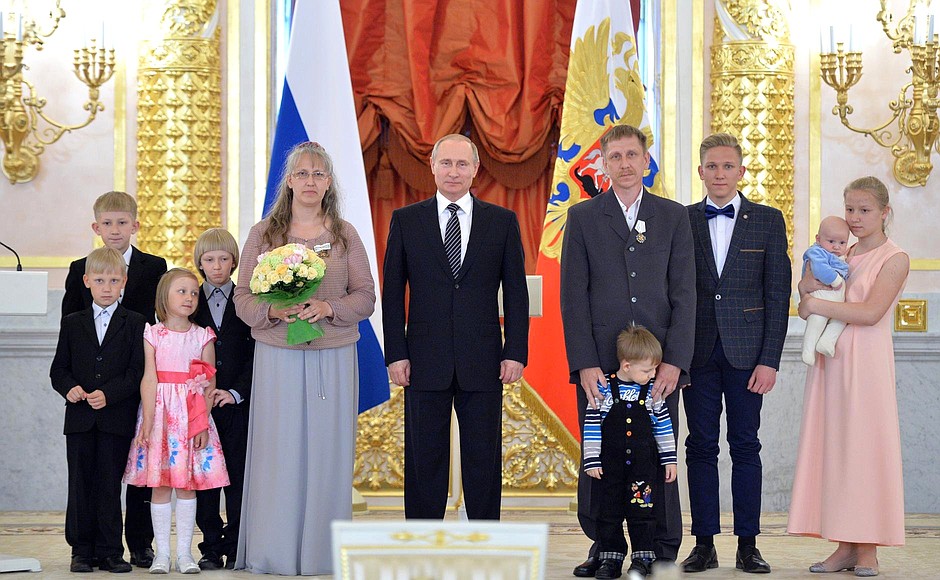 Oksana Volkova and Mikhail Maksin from Kaliningrad Region are awarded the Order of Parental Glory.