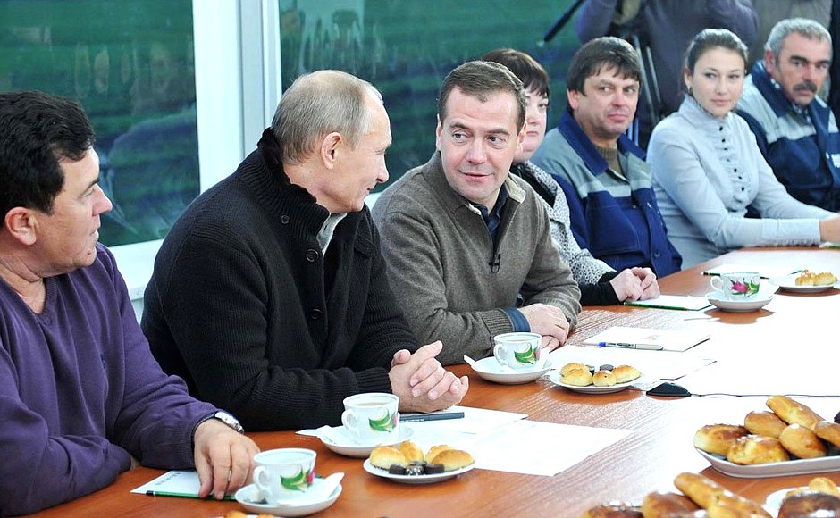 Dmitry Medvedev and Prime Minister Vladimir Putin meet with farmers and the United Russia core group during their visit to Rodina farm.