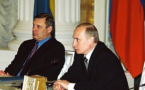 President Vladimir Putin with Russian Prime Minister Mikhail Kasyanov during the Russia-EU summit.