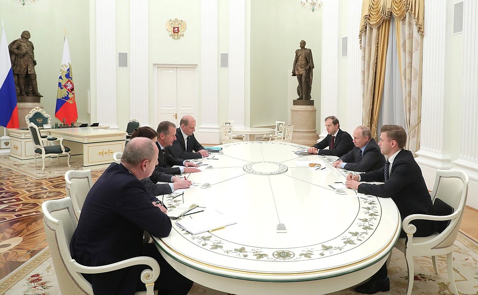 Meeting with CEO of Volkswagen Group Herbert Diess. Minister of Industry and Trade Denis Manturov, who took part in the meeting on the Russian side.