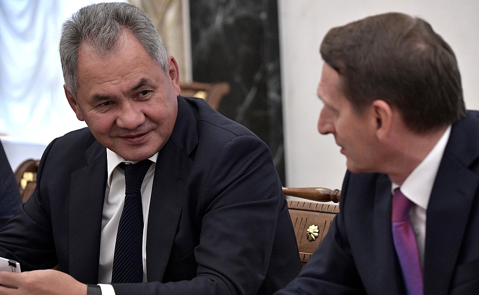 Before the meeting with permanent members of the Security Council: Defence Minister Sergei Shoigu (left) and Foreign Intelligence Service Director Sergei Naryshkin.