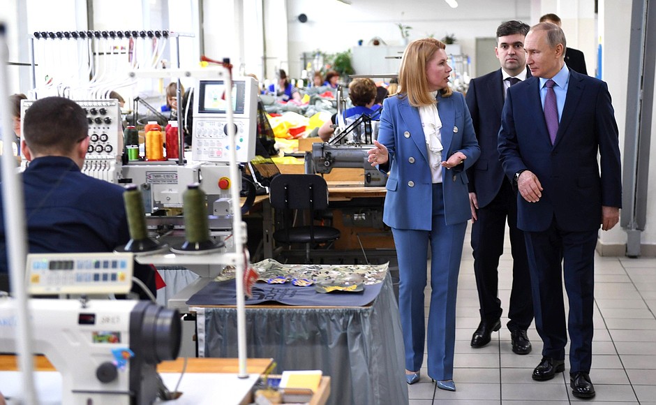 During a visit to Polyot Ivanovo Parachute Plant. With Director General Yulia Portnova.