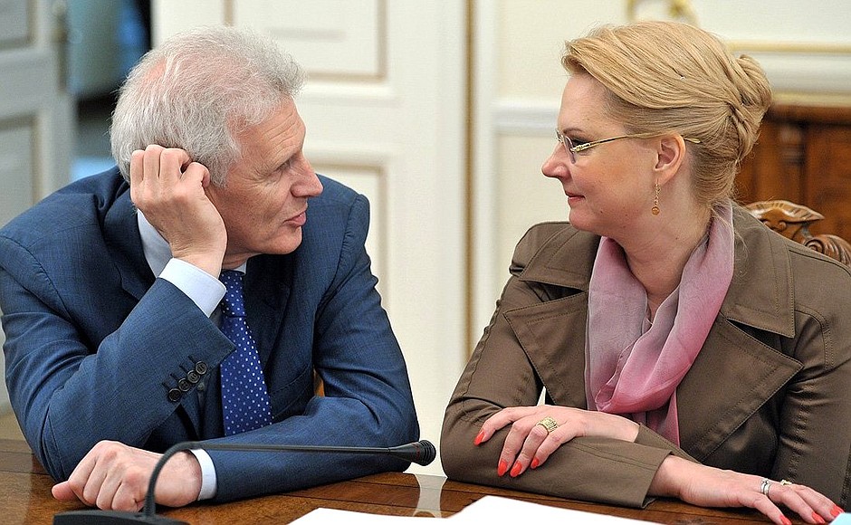 Presidential Aides Tatyana Golikova and Andrei Fursenko at a meeting on implementing presidential executive orders on social policy.