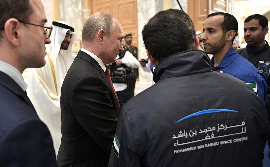 Vladimir Putin briefly talks with the first UAE astronaut Hazza Al Mansouri.