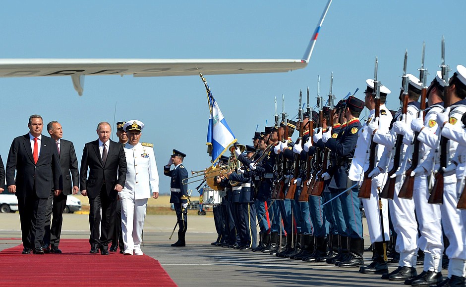 Vladimir Putin arrives on a visit to Greece.