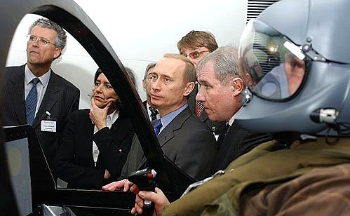 President Putin visiting the aviation company Thales Avionics.