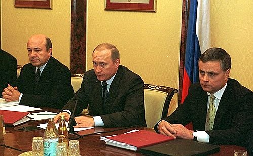 President Vladimir Putin with Igor Ivanov, Russia\'s Foreign Minister (left), and Presidential Aide Sergei Abramov, at a session of the State Council\'s Presidium.