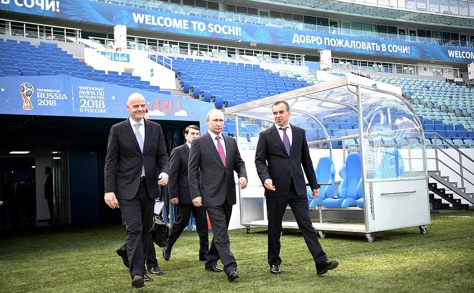 During a visit to Fisht Stadium, with FIFA President Gianni Infantino (left), Presidential Aide Igor Levitin and Governor of the Krasnodar Territory Veniamin Kondratyev (right).