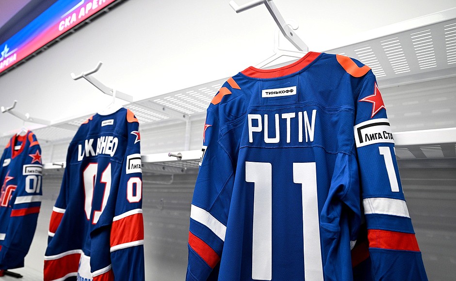 Vladimir Putin was given an ice hockey uniform during his visit to SKA Arena multi-purpose concert and sports complex.