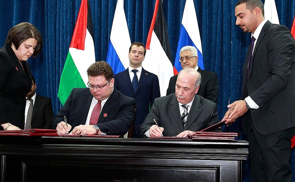 With President of Palestinian Authority Mahmoud Abbas during the signing of joint documents.