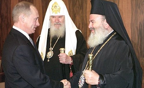 President Putin, Patriarch of Moscow and All Russia Alexii II, and head of the Greek Orthodox Church Archbishop Christodoulos of Athens and all Greece.