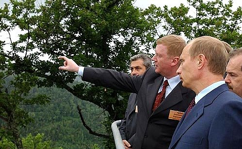 President Putin with Anatoly Chubais, Chairman of the Board of Unified Energy Systems of Russia, at an observation gallery of the Bureyskaya hydropower plant.