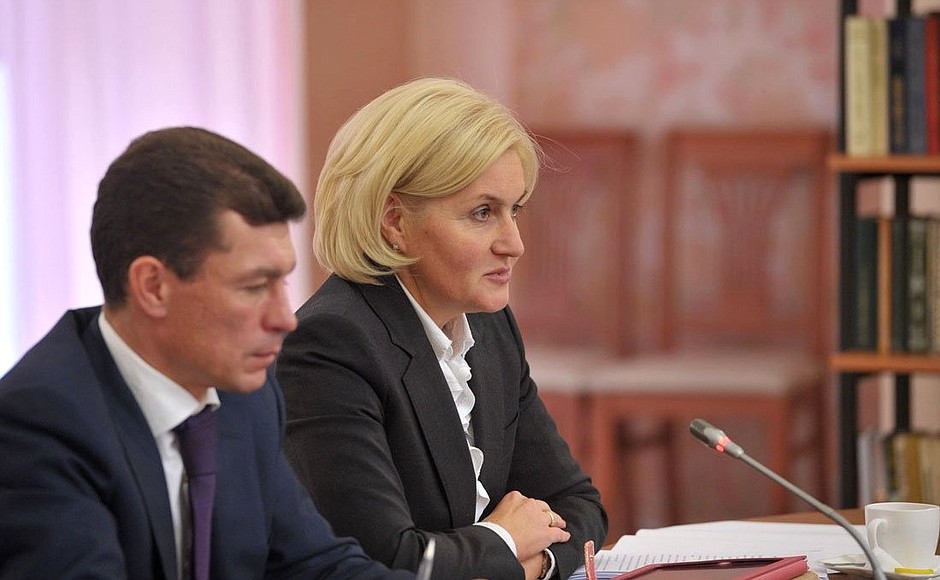 Deputy Prime Minister Olga Golodets and Labour and Social Protection Minister Maxim Topilin at a meeting with veterans and public organisation representatives.