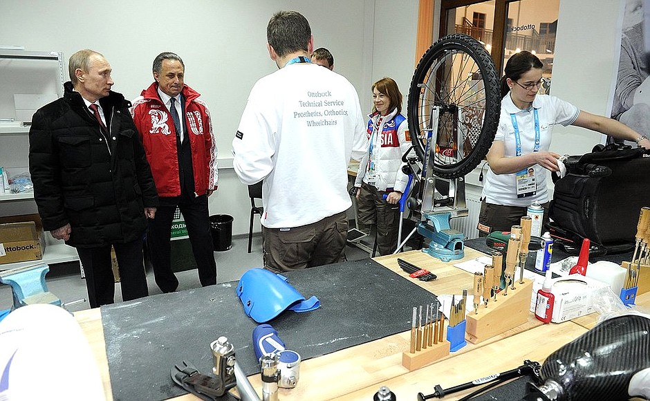 At the wheelchair and prosthesis repair workshop at the Paralympic Mountain Village.