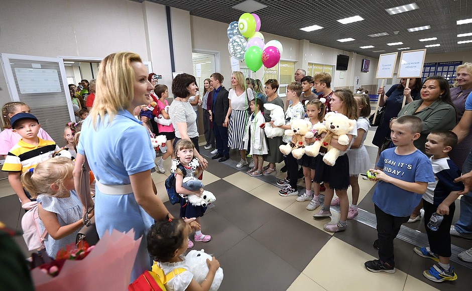 Maria Lvova-Belova brings a group of orphans to Russia for rehabilitation and placement with families.