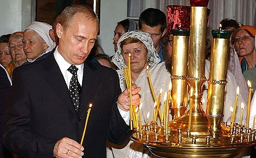 President Putin attending the Easter service at St Nicholas\' Orthodox Cathedral.
