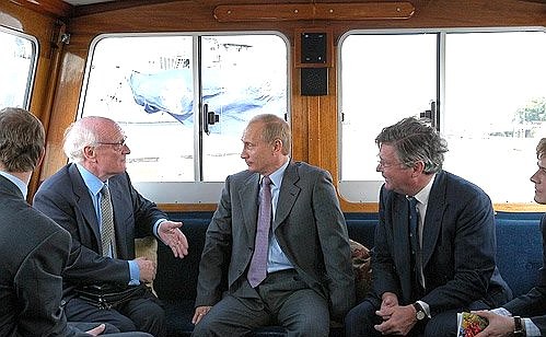 Vladimir Putin on his way to the Russian patrol ship Neustrashimy.