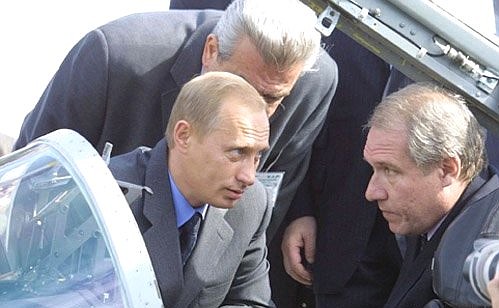 President Vladimir Putin inspecting a MIG-29 jet at the 5th Moscow aerospace show MAKS 2001.
