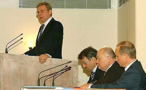 President Vladimir Putin at a joint meeting of the boards of the Finance Ministry and the Economic Development and Trade Ministry. From left to right: Finance Minister Alexei Kudrin, Economic Development and Trade Minister German Gref, Prime Minister Mikhail Fradkov, and President Vladimir Putin.