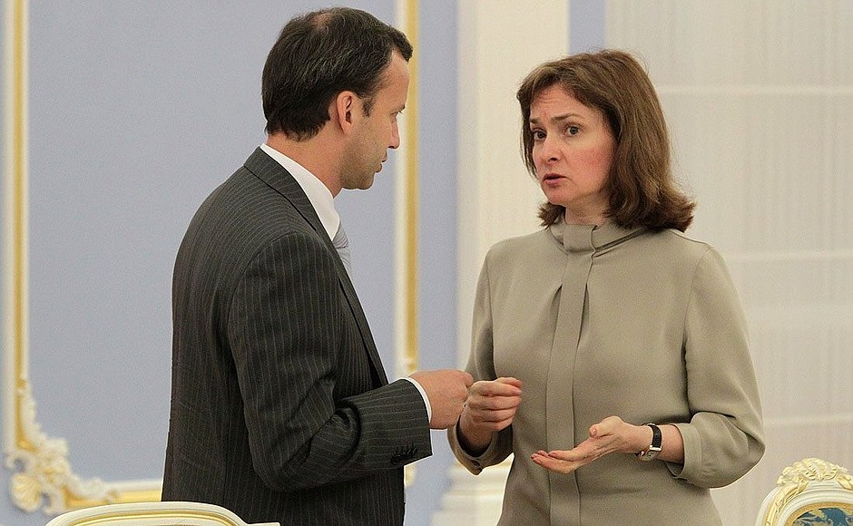 Presidential Aide Arkady Dvorkovich and Economic Development Minister Elvira Nabiullina before beginning of meeting with independent directors and government representatives within boards of directors and supervisory boards at companies with state participation.