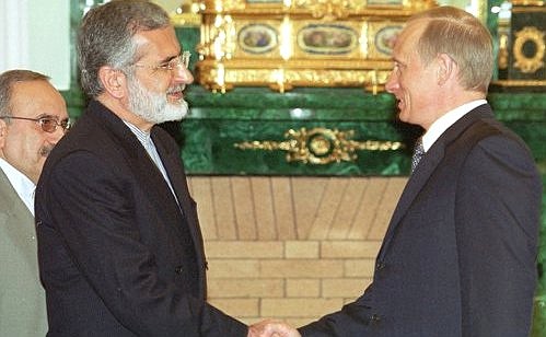 President Vladimir Putin with Kamal Kharrazi, Iranian Foreign Minister.