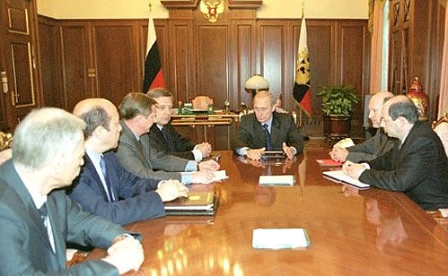 President Putin meeting with Prime Minister Mikhail Kasyanov and the heads of security agencies.