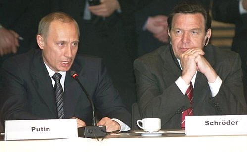President Putin and Chancellor Gerhard Schroeder at the Petersburg Dialogue Russian-German Civic Forum.