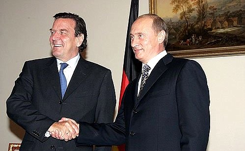 At a meeting with German Chancellor Gerhard Schroeder.