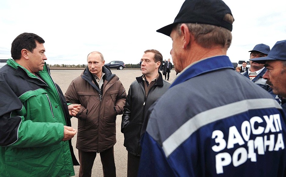 Visiting Rodina farm. With Prime Minister Vladimir Putin.