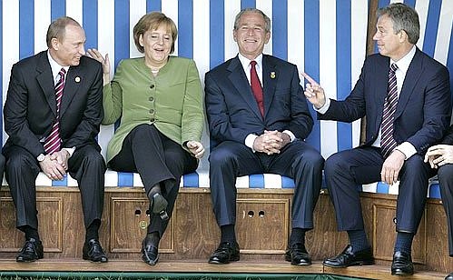 With German Federal Chancellor Angela Merkel, U.S. President George W. Bush and British Prime Minister Anthony Blair.