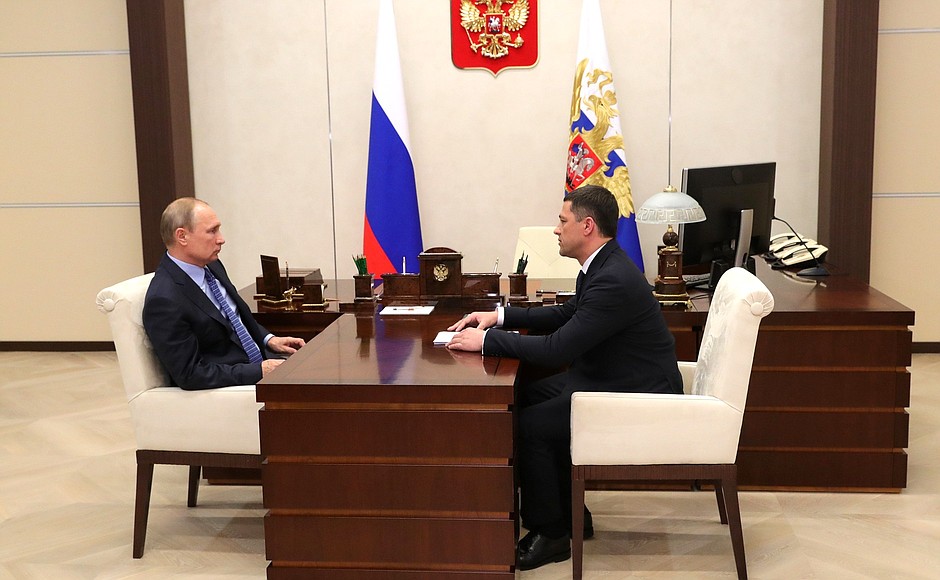 With Acting Governor of Pskov Region Mikhail Vedernikov.
