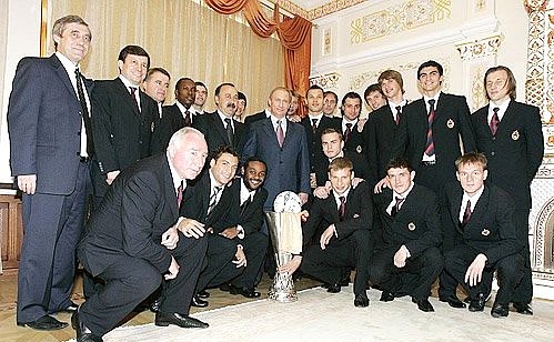 With the CSKA football team members.