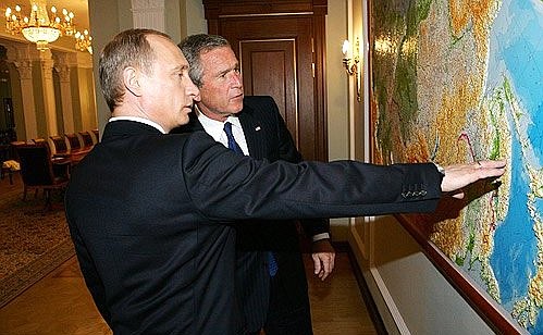 With U.S. President George W. Bush.