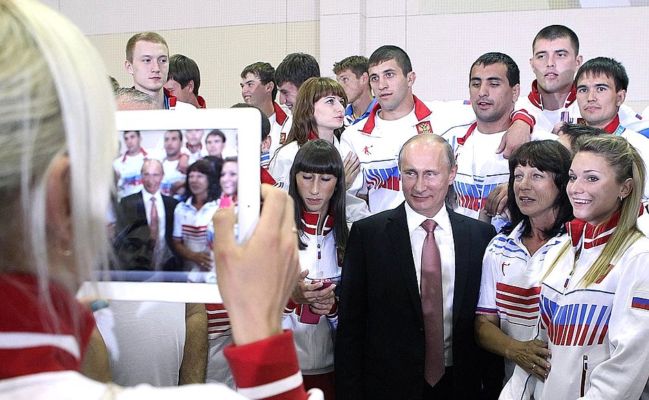 With Russian athletes who won prizes in the 27th World Summer Universiade.
