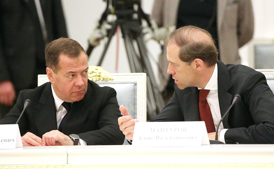 Deputy Security Council Chairman Dmitry Medvedev, left, and Deputy Prime Minister – Minister of Industry and Trade Denis Manturov before a meeting with heads of defence industry enterprises.