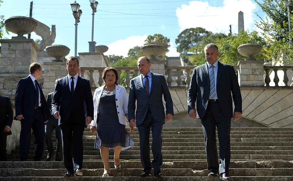 Visiting the Mithridates Staircase. With Head of the Republic of Crimea Sergei Aksyonov (right), Prime Minister Dmitry Medvedev, and General Director of the Eastern Crimea Historical and Cultural Museum and Park Tatyana Umrikhina.