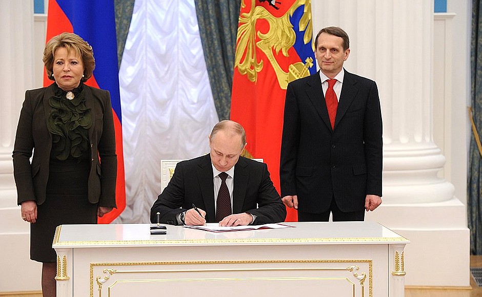 Ceremony signing the laws on admitting Crimea and Sevastopol to the Russian Federation.
